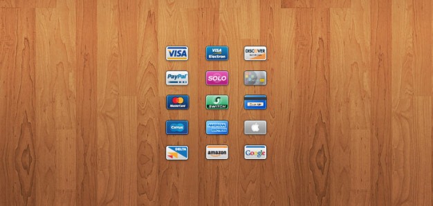 mini cards  of Credit card icons over wood background