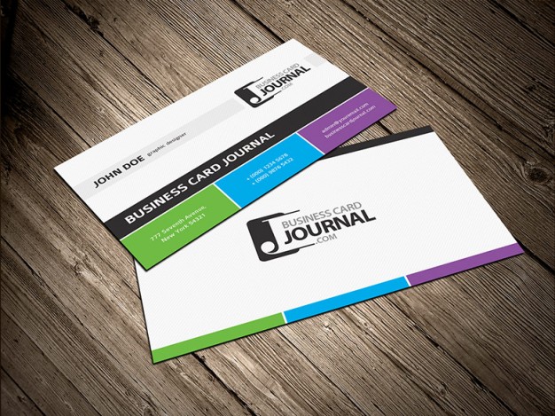 tricolor business card template with three colors bottom over wood surface