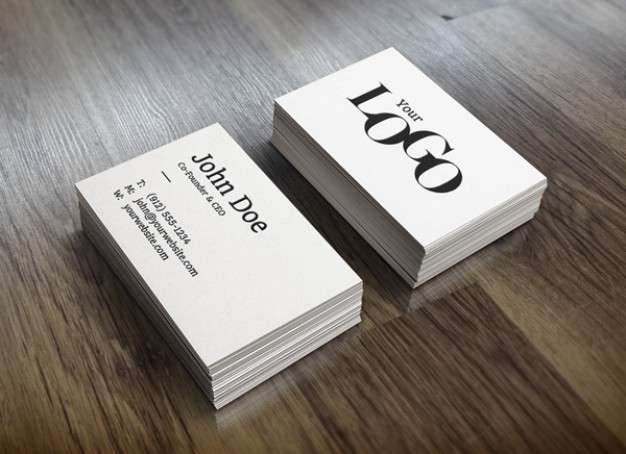 white stack business cards mockup putting on wood table surface