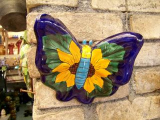 Oaxaca mexican Mexico craft butterfly colour stopping on wall about Alebrije Mitla