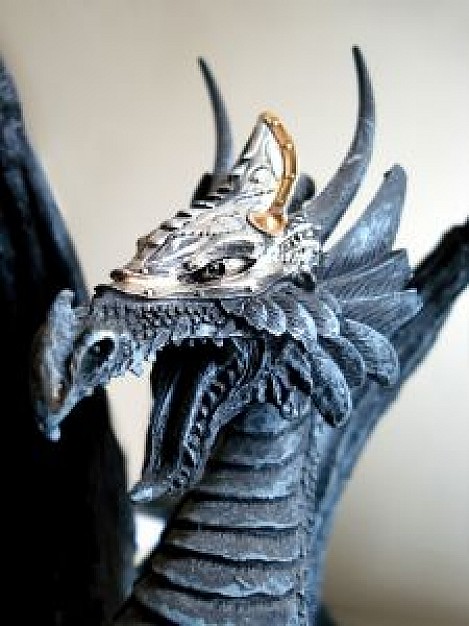 blue dragon with helm in metal