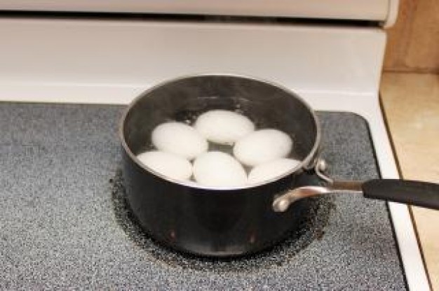 eggs on a stove put at table