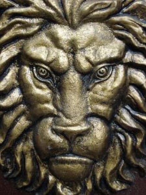 forge copper sculpture with powerful lion face