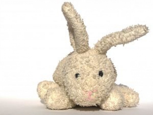 little rabbit toy lying on surface