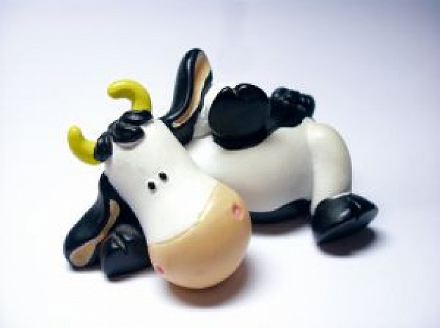 vaca Cow toy with lying pose