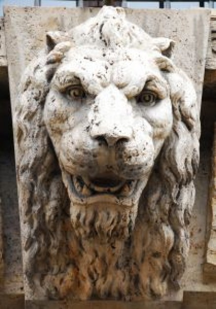 lion head stone carving in front view