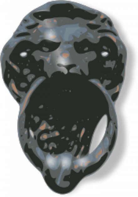 metallic door knocker with lion face