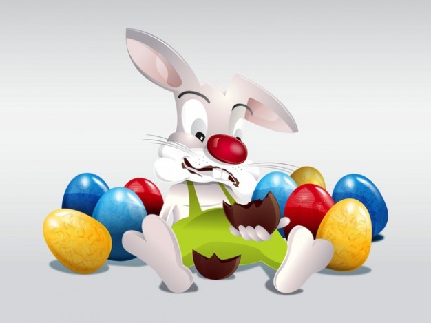 Easter bunny sitting in funny colorful eggs