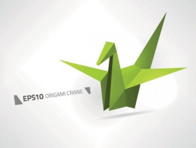Green origami crane with gray background