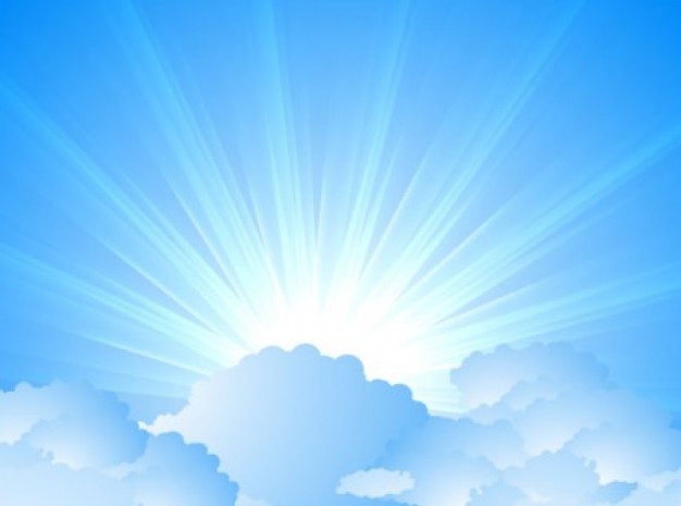 clouds and sunburst over blue sky background