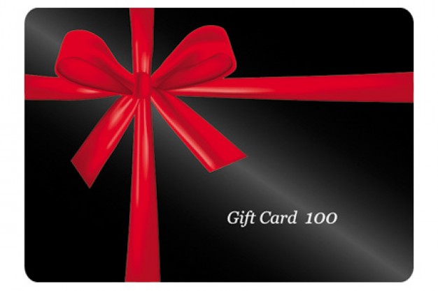 Gift card with red Red ribbon around his black gift cards material about Christmas card